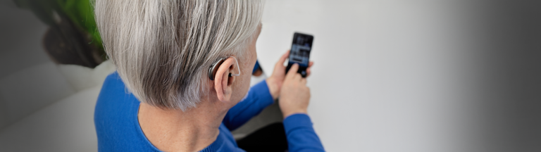 Changing your hearing aid's volume and programs